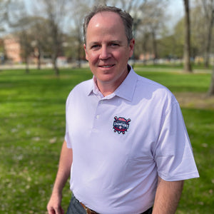 Ole Miss Alumni Association + Horn Legend Men's National Champion Performance Golf Polo